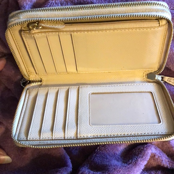 Coach signature embossed double zippered wallet. - Picture 2 of 4